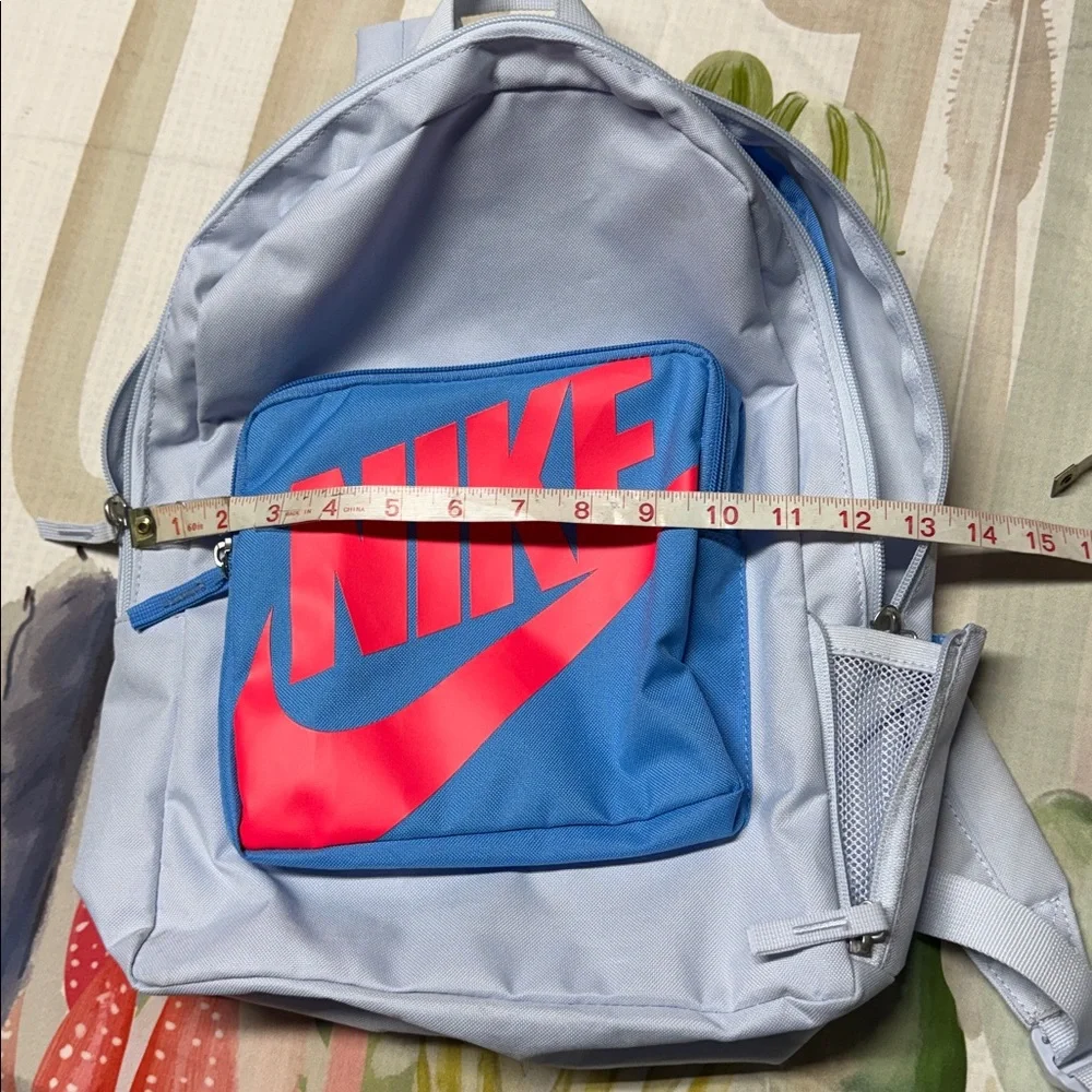 Nike Classic Kids' Backpack in Football Grey with a University Blue Bright logo